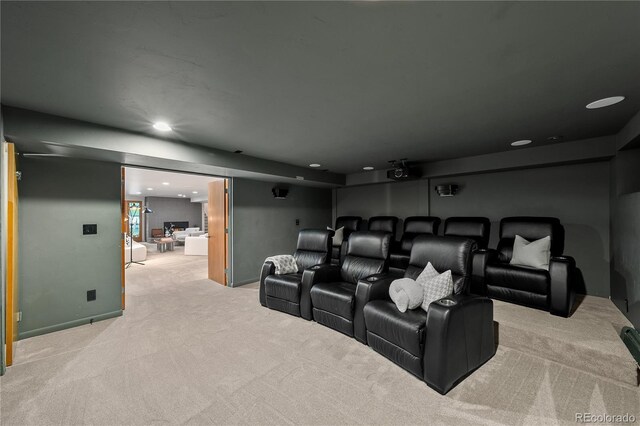 home theater room with carpet flooring and recessed lighting