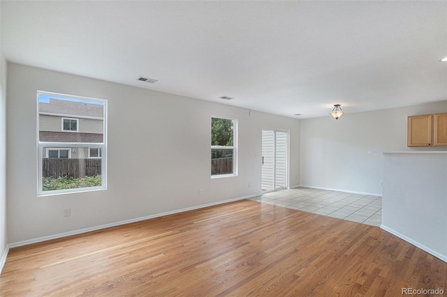 5531 S Quemoy Cir, Aurora, CO 80015 - empty room featuring light wood finished floors and baseboards