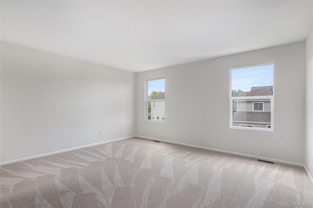 5531 S Quemoy Cir, Aurora, CO 80015 - spare room featuring carpet