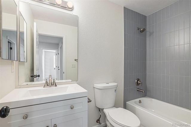 5531 S Quemoy Cir, Aurora, CO 80015 - full bathroom with  shower combination, vanity, and a textured wall