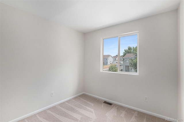 5531 S Quemoy Cir, Aurora, CO 80015 - unfurnished room with baseboards and light colored carpet