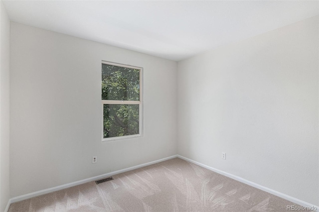 5531 S Quemoy Cir, Aurora, CO 80015 - empty room featuring carpet floors and baseboards