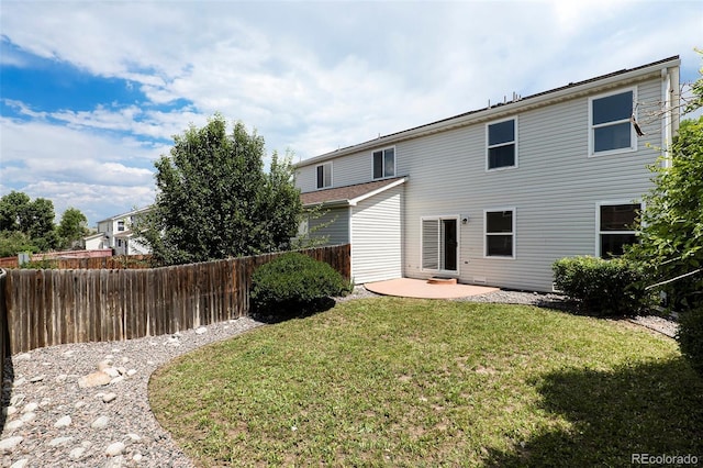 5531 S Quemoy Cir, Aurora, CO 80015 - back of property featuring a patio