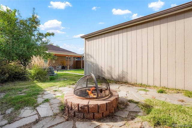 view of patio / terrace featuring a fire pit