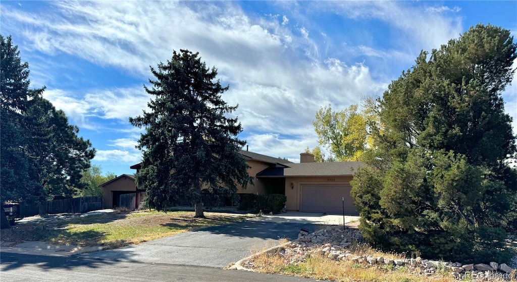 view of front of property with a garage