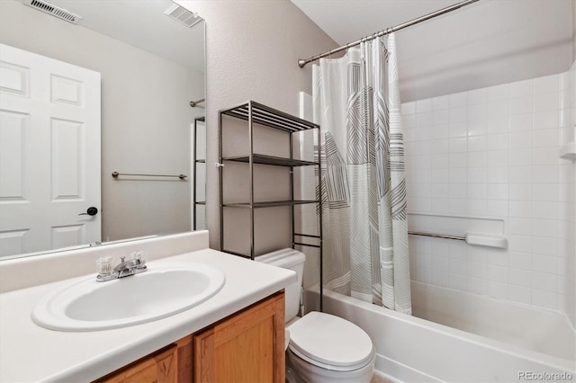 full bathroom with vanity, shower / bathtub combination with curtain, and toilet