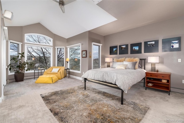 bedroom featuring a baseboard heating unit, baseboards, lofted ceiling, and carpet floors