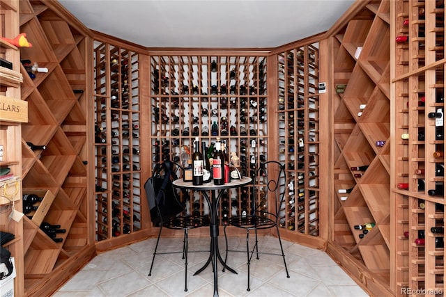 wine area with tile patterned flooring