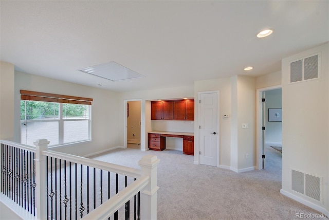1839 Caleta Trl, Longmont, CO 80504 - corridor with light colored carpet, a heating unit, an office area, recessed lighting, and an upstairs landing