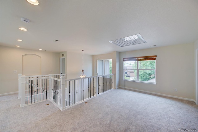 1839 Caleta Trl, Longmont, CO 80504 - carpeted empty room featuring a smoke detector and recessed lighting