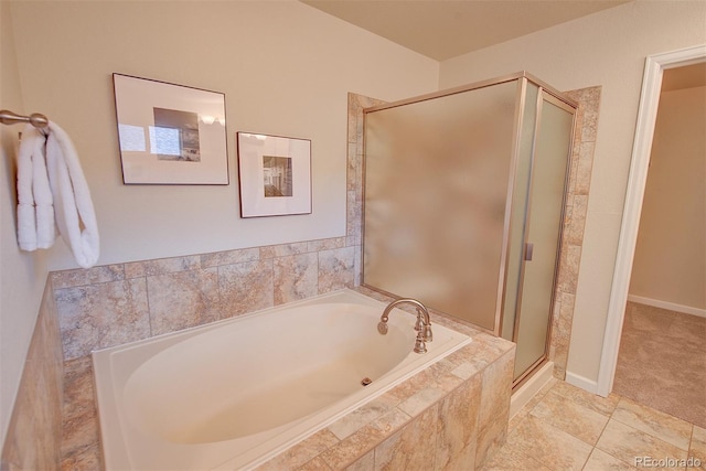 1839 Caleta Trl, Longmont, CO 80504 - full bathroom featuring a bath and a shower stall