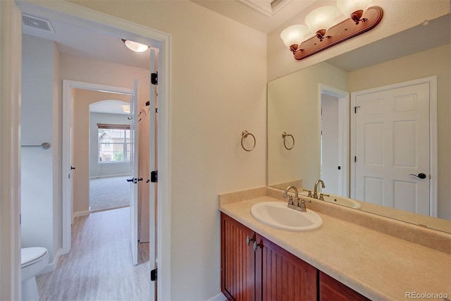 1839 Caleta Trl, Longmont, CO 80504 - bathroom featuring vanity and wood finished floors