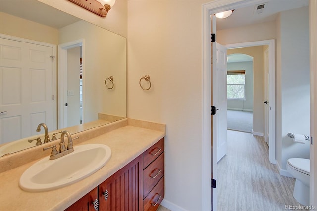 1839 Caleta Trl, Longmont, CO 80504 - bathroom featuring vanity and wood finished floors