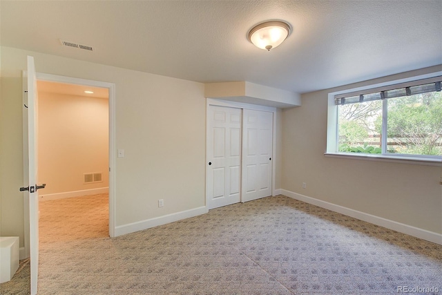 1839 Caleta Trl, Longmont, CO 80504 - unfurnished bedroom featuring a closet and carpet