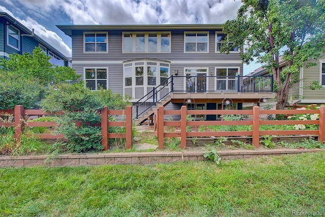 1839 Caleta Trl, Longmont, CO 80504 - rear view of house with stairs and a deck