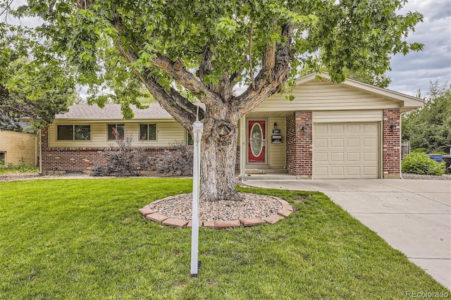 ranch-style home with a garage and a front lawn