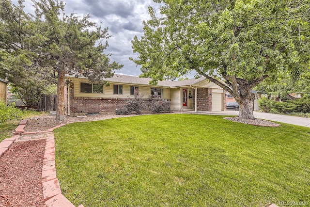 ranch-style house with a garage and a front lawn