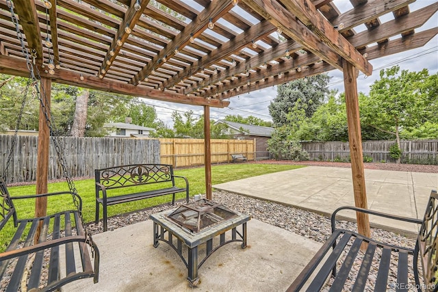 view of patio with an outdoor fire pit and a pergola