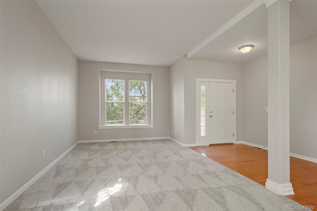 foyer entrance with light wood-type flooring