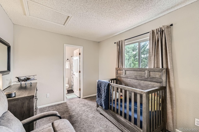 4567 Flanders Way, Denver, CO 80249 - bedroom with carpet floors, a textured ceiling, attic access, and baseboards