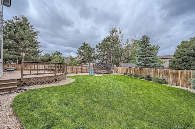 4567 Flanders Way, Denver, CO 80249 - view of yard featuring a deck
