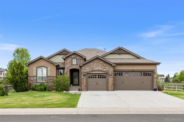 8101 Wynstone Dr, Windsor, CO 80550 - craftsman house featuring an attached garage, concrete driveway, stucco siding, stone siding, and a shingled roof