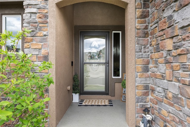 8101 Wynstone Dr, Windsor, CO 80550 - property entrance with stone siding