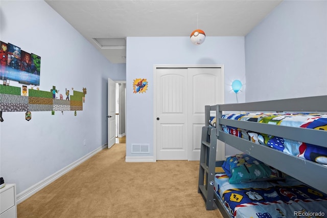 8101 Wynstone Dr, Windsor, CO 80550 - carpeted bedroom featuring attic access, a closet, and baseboards