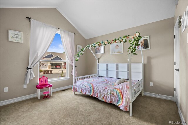 8101 Wynstone Dr, Windsor, CO 80550 - bedroom featuring carpet flooring, vaulted ceiling, and baseboards