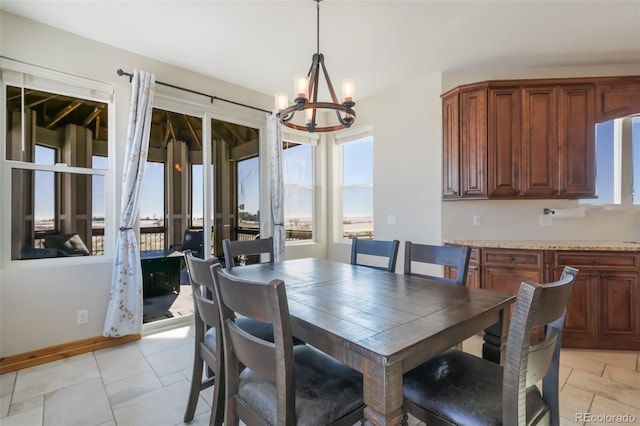 dining area with a chandelier