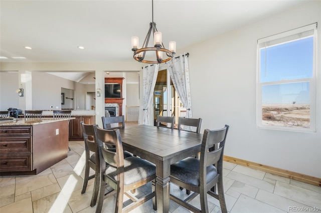 dining room with a notable chandelier