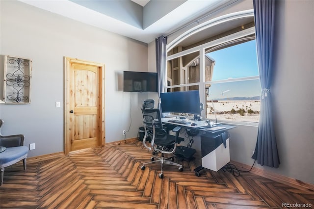 office space featuring dark parquet floors