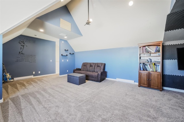 living area featuring carpet floors and vaulted ceiling