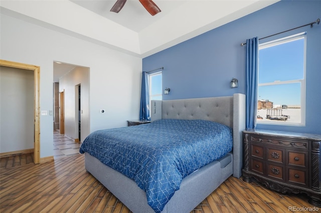 bedroom featuring ceiling fan and hardwood / wood-style floors