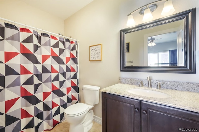 bathroom featuring ceiling fan, toilet, and vanity