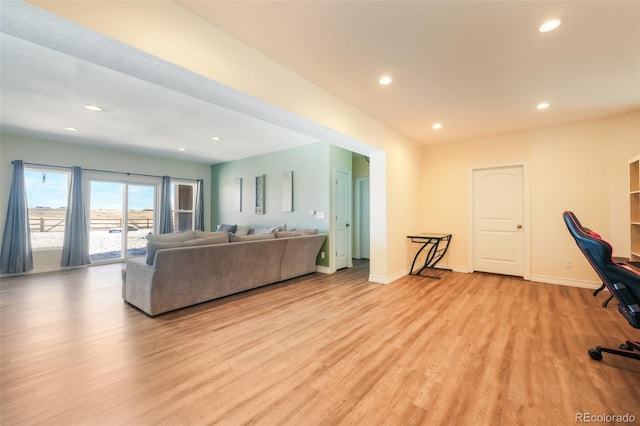 living room with light hardwood / wood-style floors