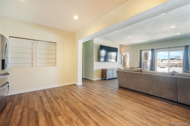 unfurnished living room featuring light hardwood / wood-style flooring