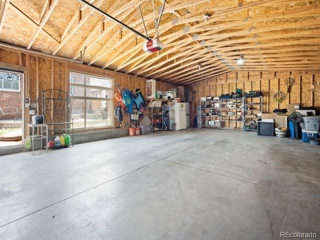 2995 Albion St, Denver, CO 80207 - garage featuring a garage door opener