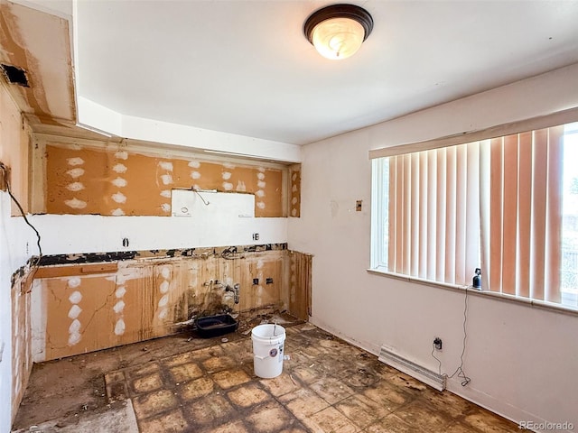 8771 Rutgers St, Westminster, CO 80031 - kitchen featuring a baseboard radiator