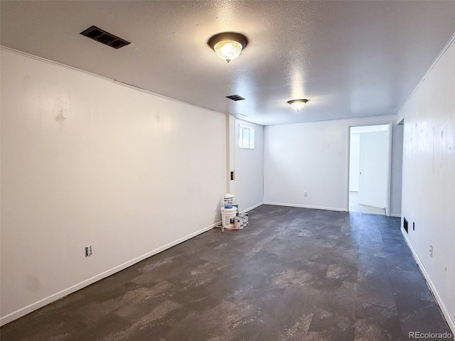 8771 Rutgers St, Westminster, CO 80031 - basement featuring a textured ceiling and baseboards