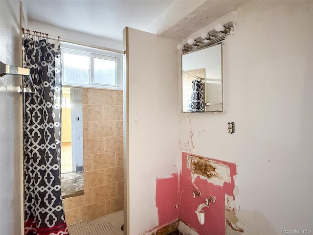 8771 Rutgers St, Westminster, CO 80031 - bathroom featuring tiled shower