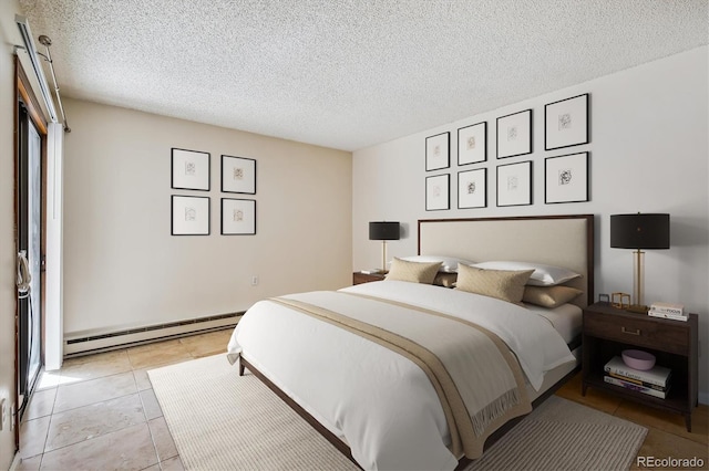 13950 E Oxford Pl Unit B105, Aurora, CO 80014 - bedroom with a baseboard radiator, a textured ceiling, and light tile patterned floors