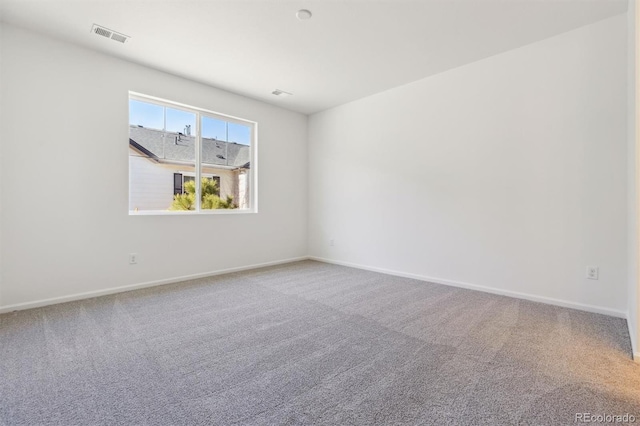 empty room featuring carpet flooring