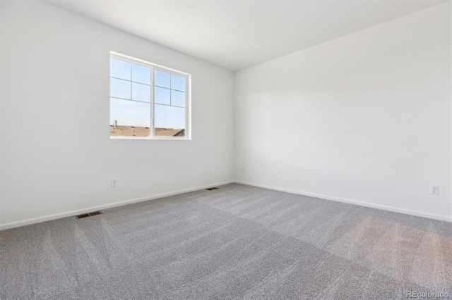 unfurnished room with carpet