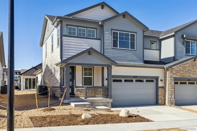 view of front of property featuring a garage and covered porch