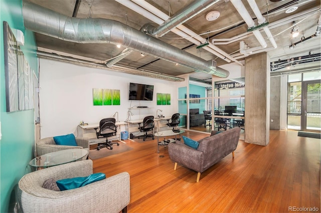 1401 Wewatta St # 101And # 102, Adjoined Denver, CO 80202 - living area with a desk and wood finished floors