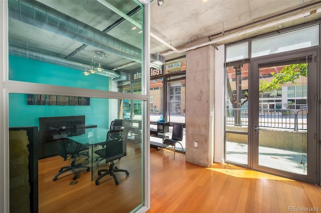 office with hardwood / wood-style flooring