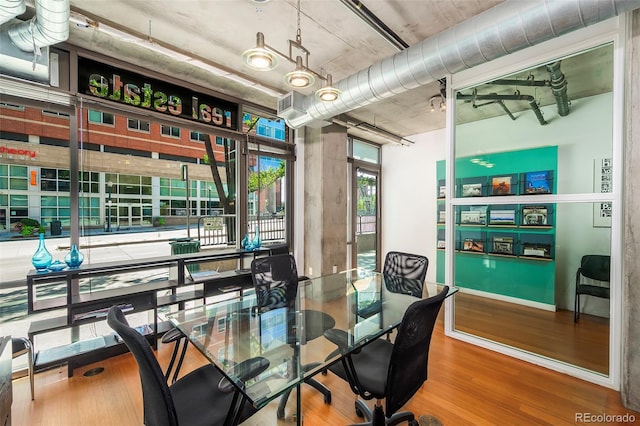 1401 Wewatta St # 101And # 102, Adjoined Denver, CO 80202 - dining room featuring wood finished floors and an office area