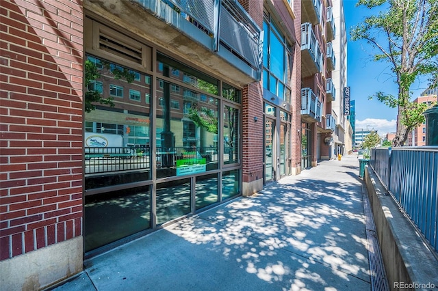 1401 Wewatta St # 101And # 102, Adjoined Denver, CO 80202 - doorway to property with brick siding