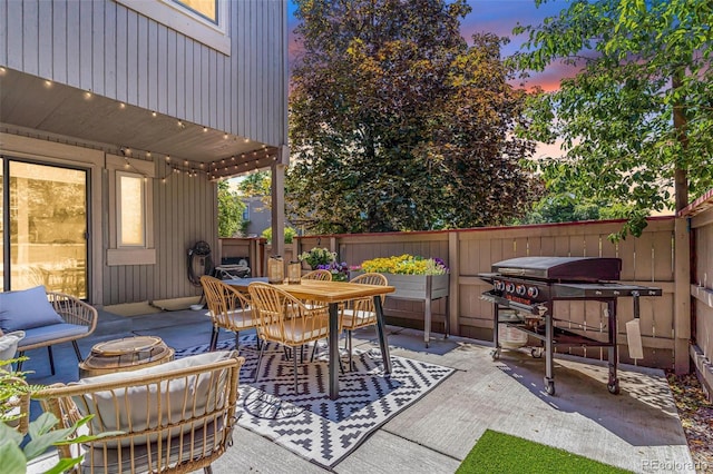 1152 S Yosemite Way Unit 29, Denver, CO 80247 - view of patio featuring outdoor dining area